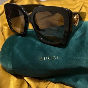 Gucci Black and Gold Sunglasses